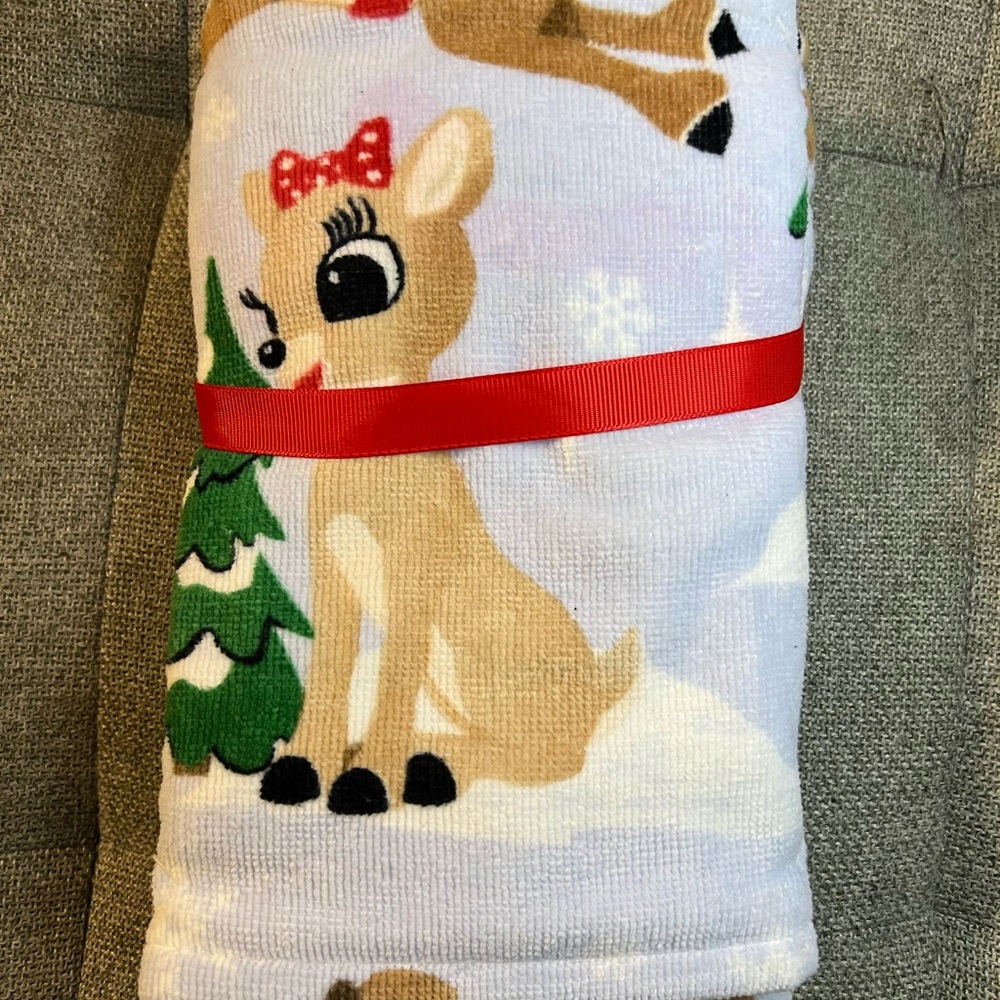 A Rare Find! Brand New, 2-pack Christmas hand towels of Rudolph and Clarice.
